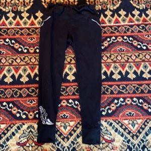 Athleta Leggings in black with flower pattern
